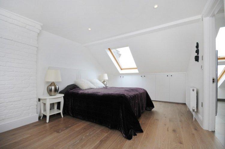 Дизайн спальни в мансарде - фото