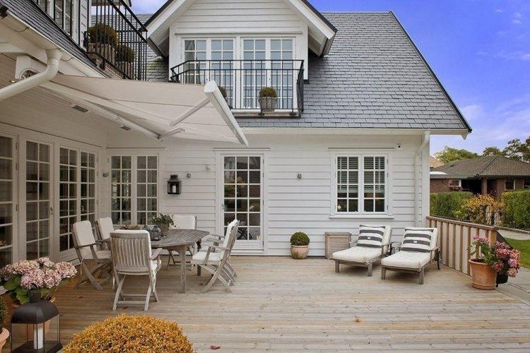 Дом в скандинавском стиле с крыльцом или террасой - проекты и фото