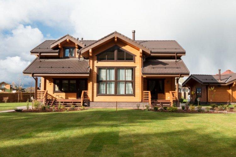 Двухэтажные дома из бруса - проекты и фото