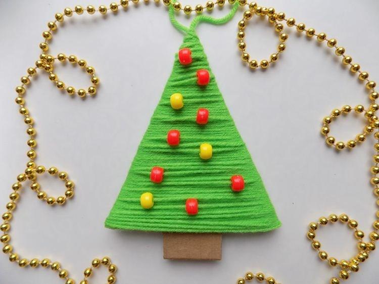 Елка из ниток своими руками - фото и идеи