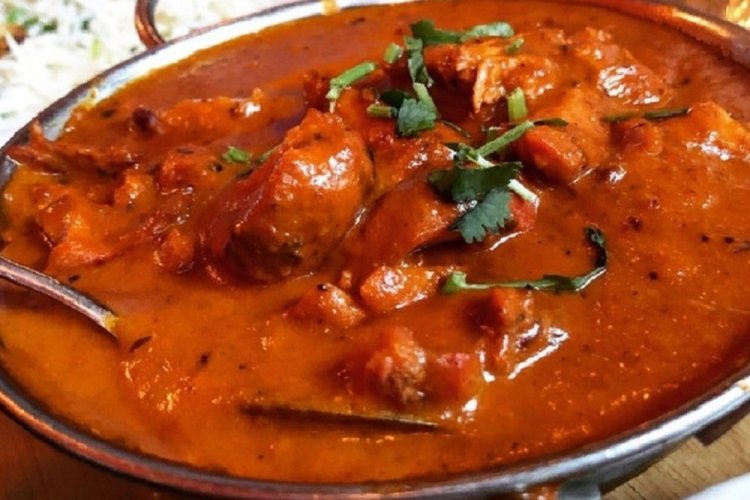 Тушеный говяжий язык в томате