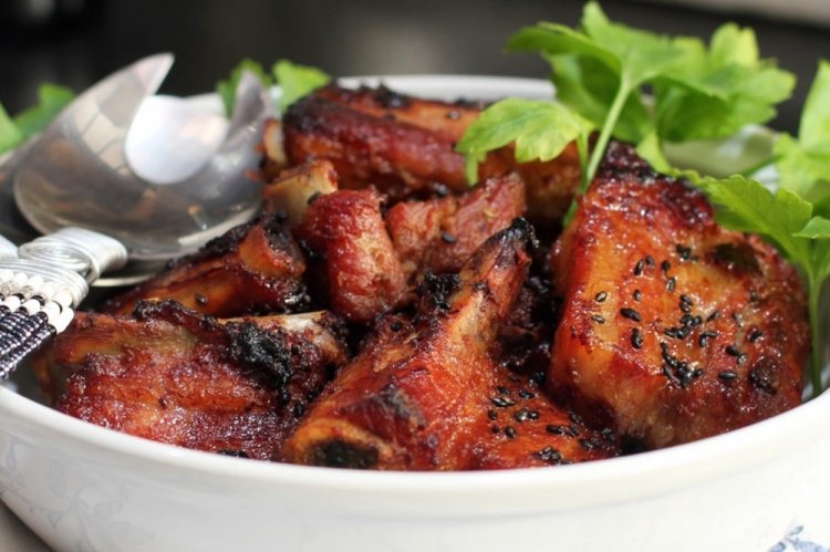 Свиные ребрышки с апельсином в рукаве