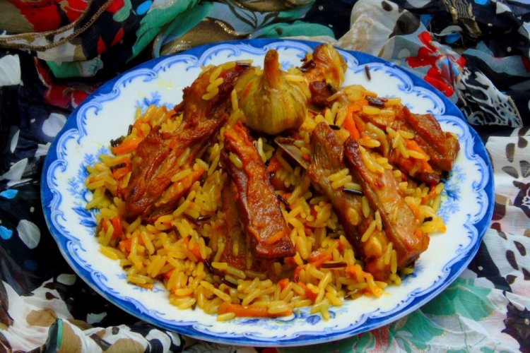 Плов со свиными ребрышками в казане