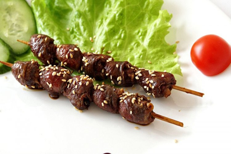 Куриные сердечки с соевым соусом и чесноком на мангале