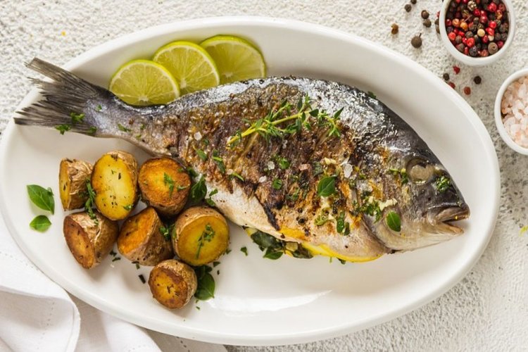 Дорадо с лимонным маслом на гриле